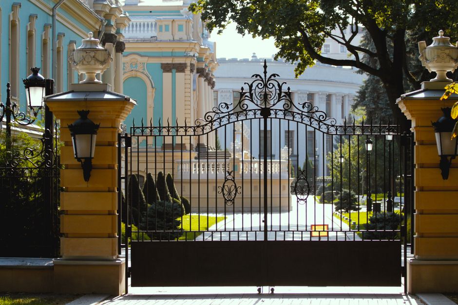 Close view of a metal gate frame and hinge